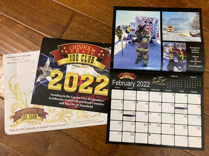 Photo of Chisolm Trail 100 Club calendar with ESS photos.
